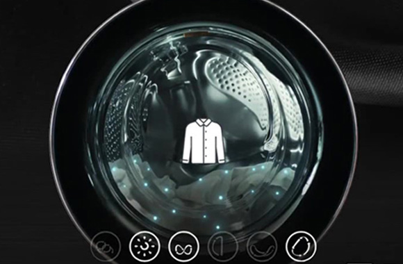 Imazhi tregon makinën duke larë rrobat dhe ilustron inteligjencën artificiale që zbulon ngarkesën.